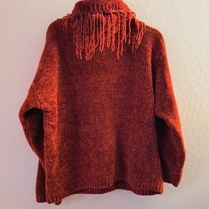 A medium red sweater